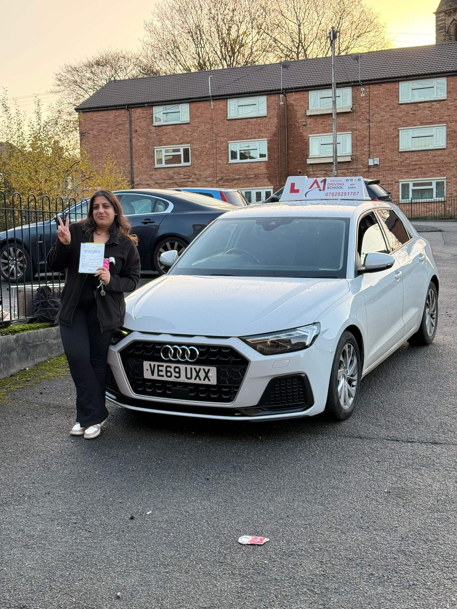 A1 Intensives student celebrating passing their UK driving test (success story 8)