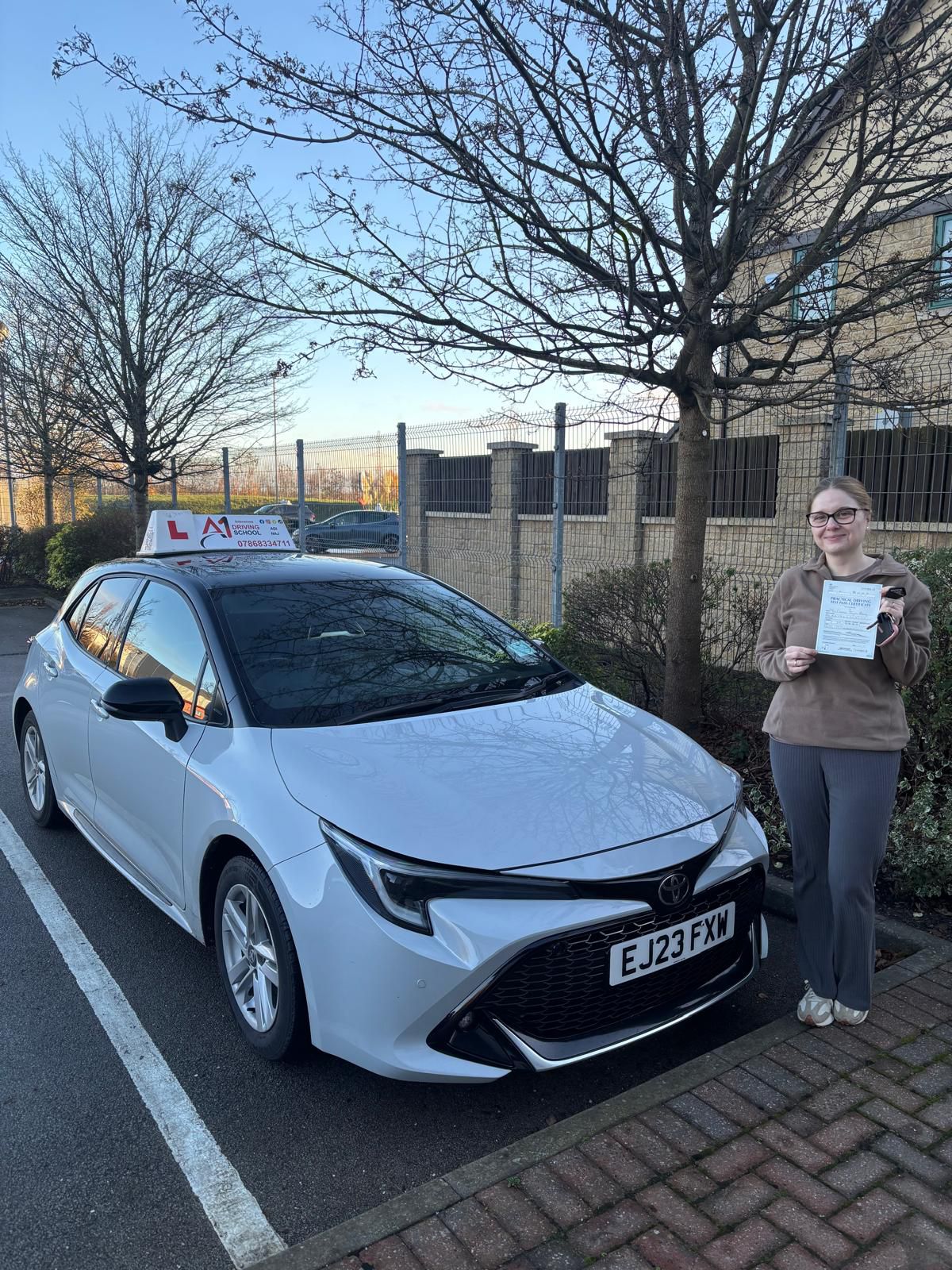 A1 Intensives student celebrating passing their UK driving test (success story 9)
